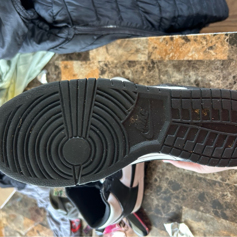 Nike Black Sneakers with Concentric Sole Design